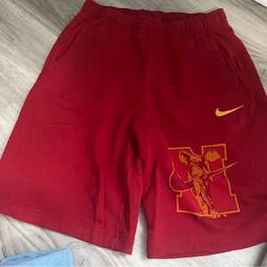 Red Nike shorts
